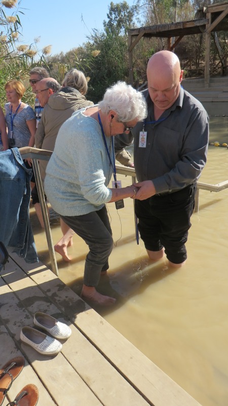 Fr Paul helps Ruth inot the River Jordan
